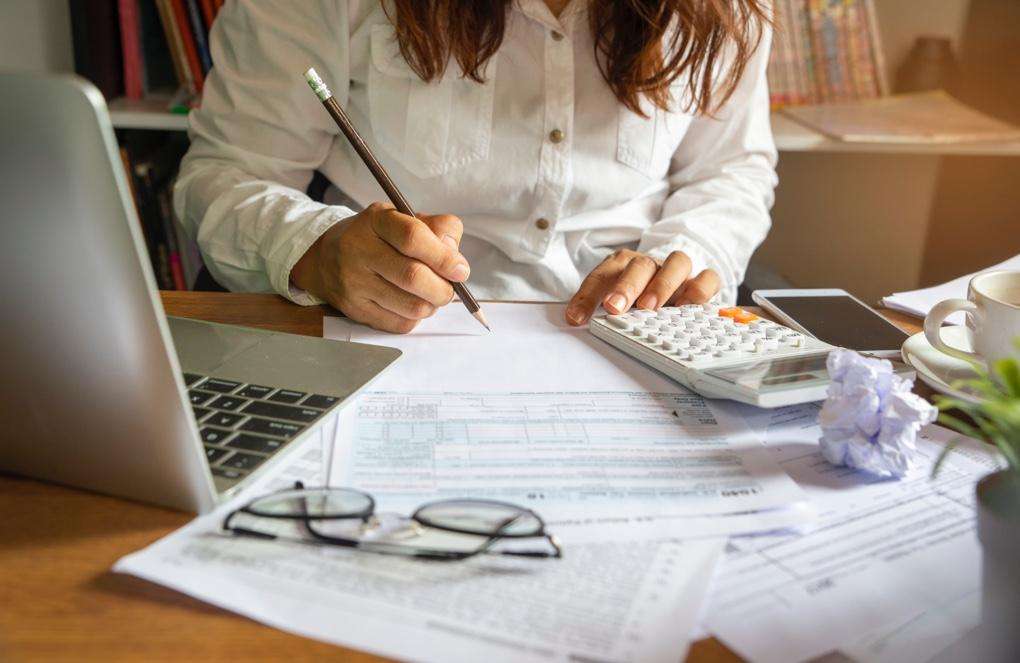 Woman budgeting Woman budgeting